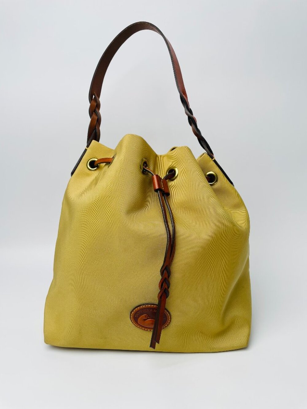 Dooney & Bourke Khaki Yellow Canvas Bucket Bag Cinch Drawstring Braided Strap